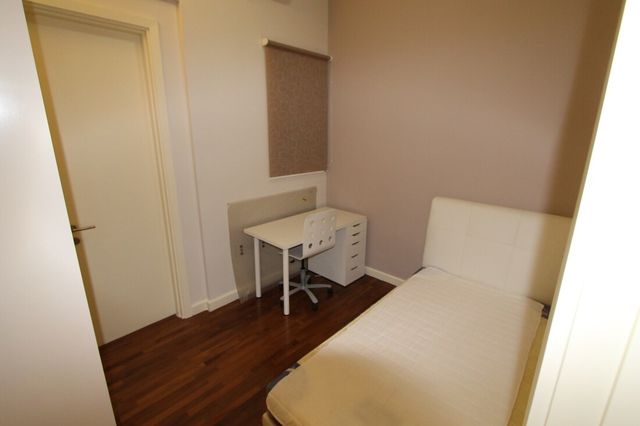 Bedroom with desk