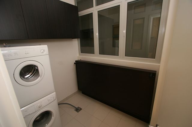 Utility room with washer and dryer